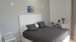 Postel nebo postele na pokoji v ubytování Hotel Carlos I