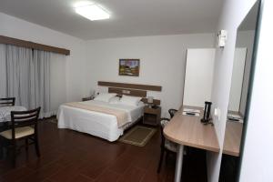 Postel nebo postele na pokoji v ubytování Hotel Schroeder