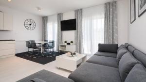 a living room with a couch and a table at S Luxury Apartments in Split