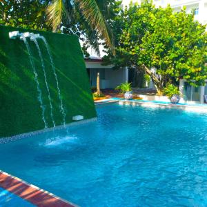 Bazén v ubytování Hotel Maya Caribe Faranda Cancún nebo v jeho okolí