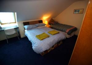 Postel nebo postele na pokoji v ubytování Sona Baile Home Stay