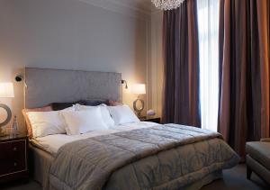 Säng eller sängar i ett rum på Grand Hôtel Stockholm