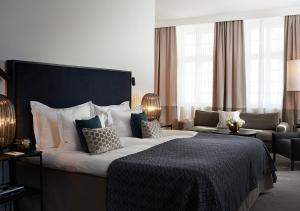 Säng eller sängar i ett rum på Grand Hôtel Stockholm