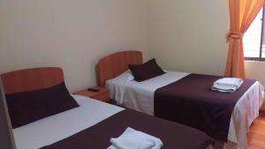 Postel nebo postele na pokoji v ubytování Hostal Sol de Atacama