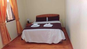 Postel nebo postele na pokoji v ubytování Hostal Sol de Atacama