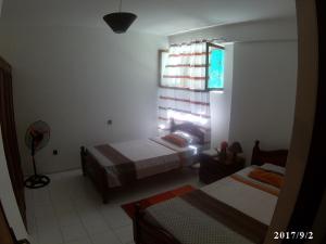 Postel nebo postele na pokoji v ubytování Arla Residential + 20 fotografií