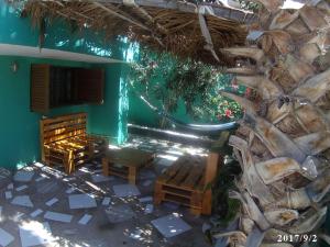 an overhead view of a building with a tree at Arla Residential in Mindelo