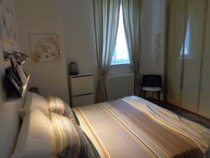 Postel nebo postele na pokoji v ubytování Alice's Inn