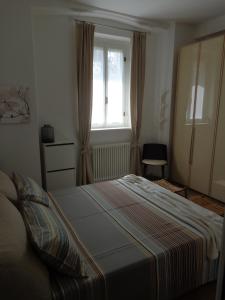 Postel nebo postele na pokoji v ubytování Alice's Inn