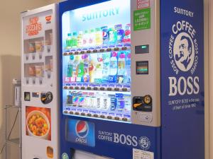 a sunbury coffee boss vending machine in a store at Nikko Station Hotel 2 in Nikko