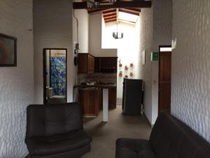 Kuchyň nebo kuchyňský kout v ubytování Fami Hotel Vive Jardin