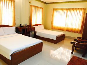 Krevet ili kreveti u jedinici u okviru objekta Apsara Guest House Kampot City