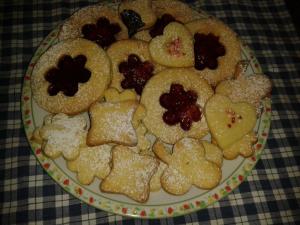 a plate full of cookies on a table at B&B Casa Francesca in Alano di Piave