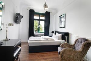 Postel nebo postele na pokoji v ubytování Höhen Hotel Viersen