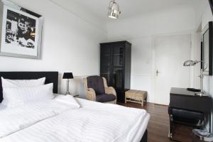 Postel nebo postele na pokoji v ubytování Höhen Hotel Viersen