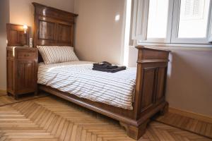 Postel nebo postele na pokoji v ubytování Casa Mappamondo