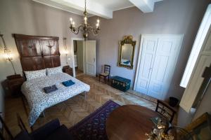 Postel nebo postele na pokoji v ubytování Casa Mappamondo