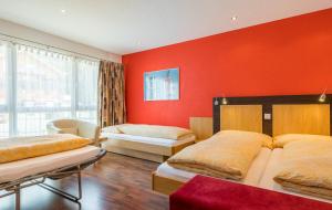 Ένα ή περισσότερα κρεβάτια σε δωμάτιο στο Hotel Blattnerhof