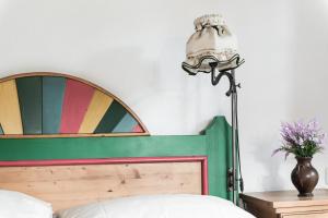 Postel nebo postele na pokoji v ubytování MONDI Bellevue Alm Gastein