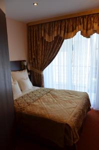 Ένα ή περισσότερα κρεβάτια σε δωμάτιο στο Dormed Medical SPA