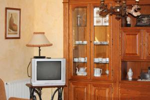 TV a/nebo společenská místnost v ubytování Palacio Lerruz I y Palacio Lerruz II