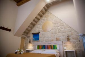 Postel nebo postele na pokoji v ubytování 3 Archi B&B