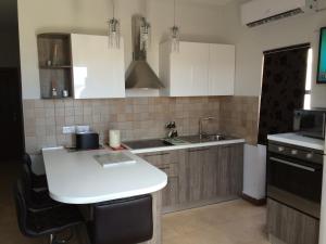 Kuchyň nebo kuchyňský kout v ubytování SEAVIEW Marsascala Apartment
