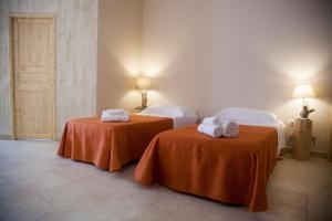 Postel nebo postele na pokoji v ubytování 3 Archi B&B
