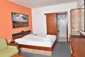 Postel nebo postele na pokoji v ubytování Hotel Kurdějov - Bed and Breakfast