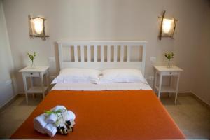 Postel nebo postele na pokoji v ubytování 3 Archi B&B