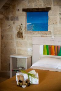 Postel nebo postele na pokoji v ubytování 3 Archi B&B
