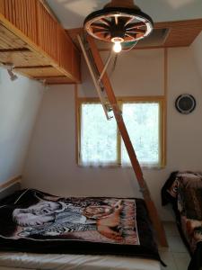 Postel nebo postele na pokoji v ubytování Tiszavirág Nyaralóház