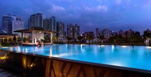Bazén v ubytování Sentosa Hotel Apartment Taoyuan Branch nebo v jeho okolí