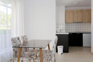A kitchen or kitchenette at St. Stefan Villas & Hotel