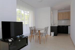 A kitchen or kitchenette at St. Stefan Villas & Hotel