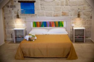 Postel nebo postele na pokoji v ubytování 3 Archi B&B