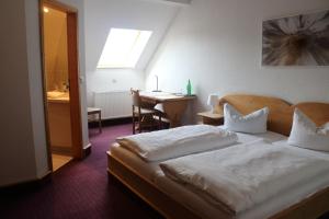 Postel nebo postele na pokoji v ubytování Hotel-Restaurant Johanneshof