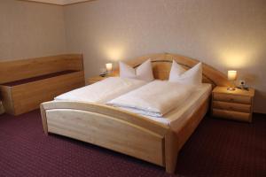 Postel nebo postele na pokoji v ubytování Hotel-Restaurant Johanneshof