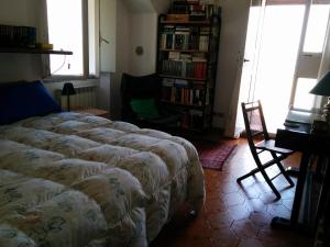 Postel nebo postele na pokoji v ubytování Casa Pierini