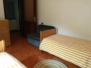 Postel nebo postele na pokoji v ubytování Casa Pierini