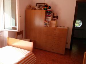Postel nebo postele na pokoji v ubytování Casa Pierini