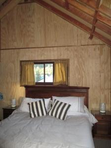 Cama ou camas em um quarto em Cabañas en Malalcahuello