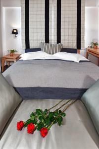 Ένα ή περισσότερα κρεβάτια σε δωμάτιο στο Olympus Thea Boutique Hotel