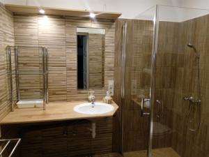 Kúpeľňa v ubytovaní Bella Apartment
