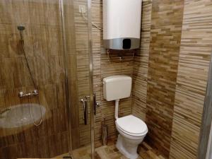 Kúpeľňa v ubytovaní Bella Apartment