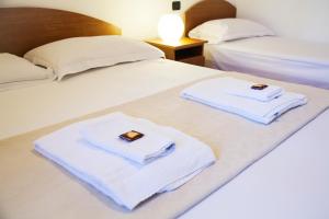 Postel nebo postele na pokoji v ubytování B&B Botton D'Oro Basiglio