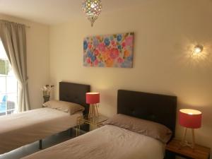 Posteľ alebo postele v izbe v ubytovaní Duplex 2 bedrooms for you with Air Conditioner