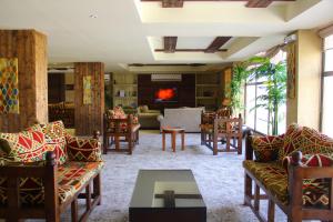 Et sittehjørne på فندق ضيافة القرية Al Diyafa Hotel