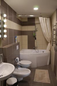 Ένα μπάνιο στο Jūros akmenėlio apartamentai Elija +33 φωτογραφίες