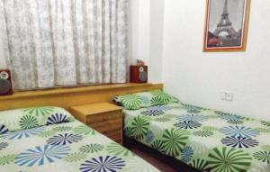 Posteľ alebo postele v izbe v ubytovaní Apartamento Edificio Diamant